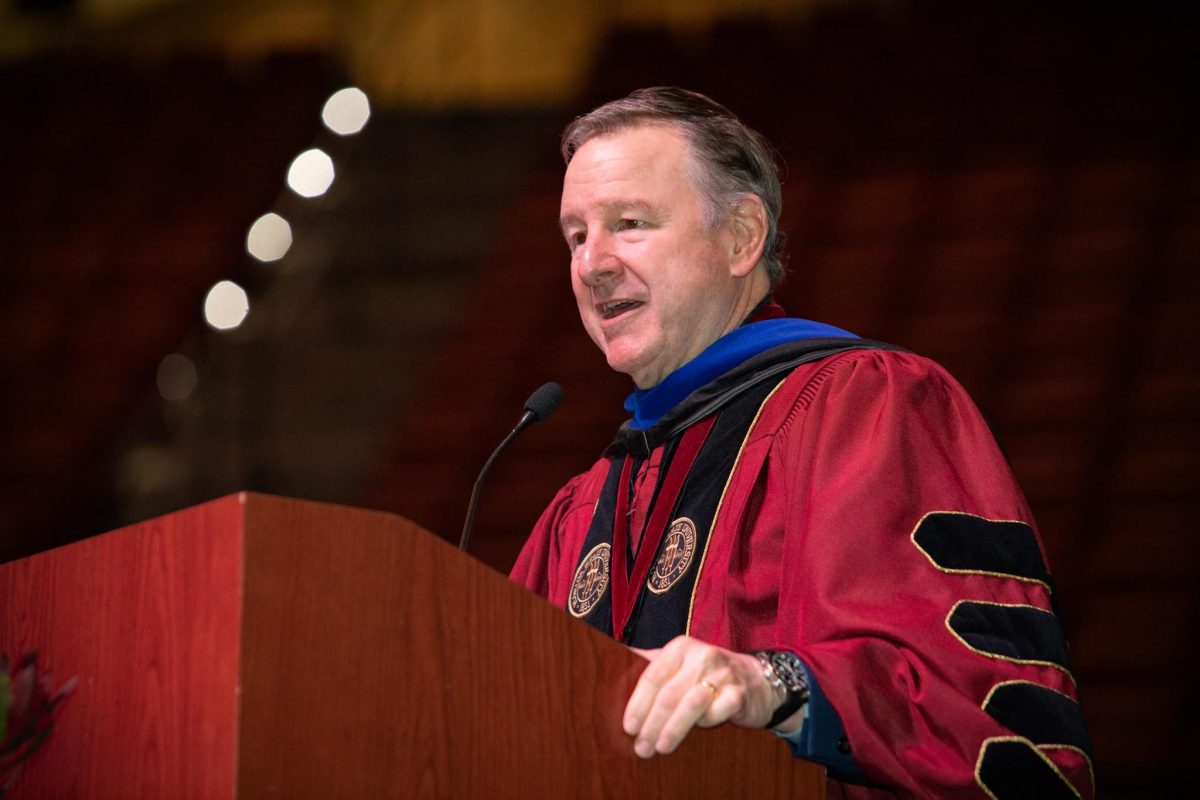 FSU President Richard McCullough addresses the audience at FSU's spring doctoral hooding ceremony Friday, May 3, 2024, at the Donald L. Tucker Civic Center. (FSU Photography)