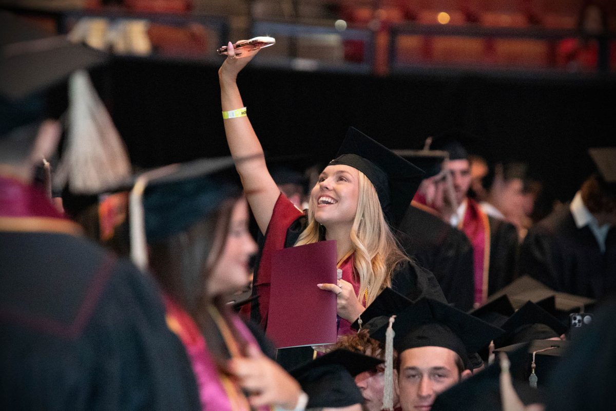 A Florida State University graduate celebrates during one of FSU's spring 2024 commencement ceremonies Friday, May 3, at the Donald L. Tucker Civic Center. (FSU Photography)