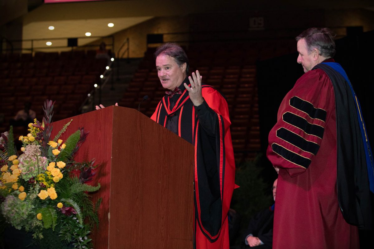 Dean of The Graduate School Mark Riley addresses the audience at one of FSU's 2024 commencement ceremonies Friday, May 3, at the Donald L. Tucker Civic Center. (FSU Photography)