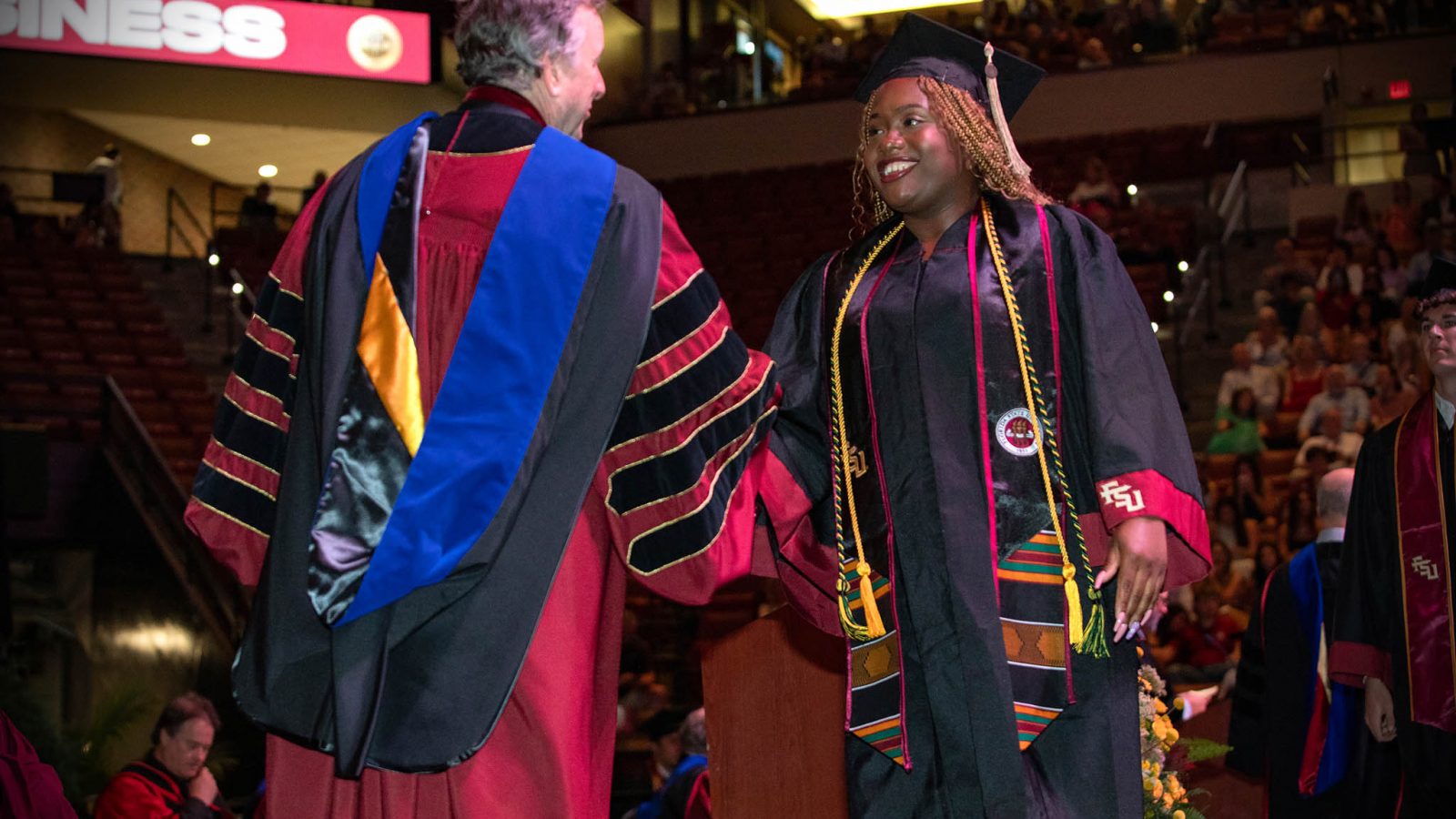 FSU President Richard McCullough shakes hands with a graduate during one of FSU's 2024 commencement ceremonies. (FSU Photography Services)