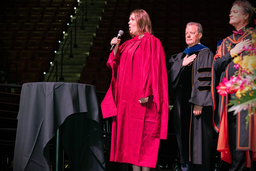 Graduate student Leah Shewmaker sings the national anthem at the summer doctoral hooding ceremony Friday, Aug. 2, 2024, at the Donald L. Tucker Civic Center. (FSU Photography)
