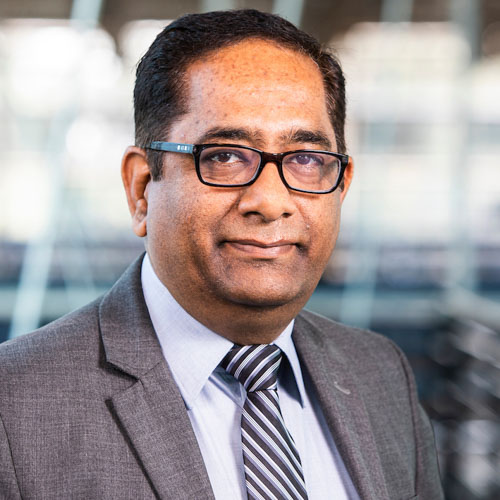 A portrait of Rajan Kumar.