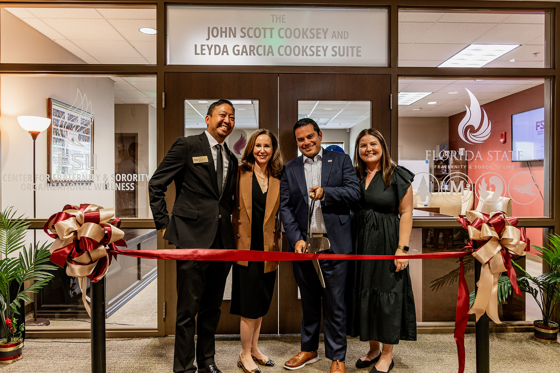 Pictured l-r: Zduy Chu, assistant vice president for Student Affairs; Amy Hecht, vice president for Student Affairs; Freddy Juarez, director of Fraternity and Sorority Life; and Brittany Devies, director for the Center for Fraternity and Sorority Organizational Wellness at the ribbon cutting ceremoney Sept. 10.