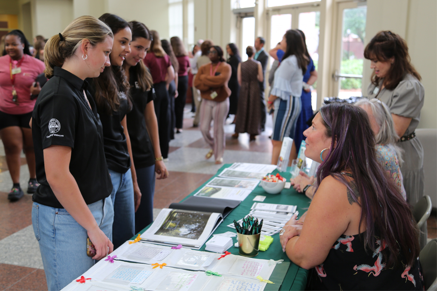 Students speak to members of Big Bend Hospice. The hospice is one of seven College of Medicine Pediatric Outreach programs that shares in the funds to benefit children and youth over an eight-county area. (Jack Rizzo/FSU College of Medicine)