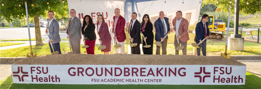 Officials from Florida State University, Tallahassee Memorial Healthcare, the Florida Agency for Health Care Administration and Ajax Building Company attend a groundbreaking ceremony for the new academic medical center. (Bill Lax/FSU Photography Services)