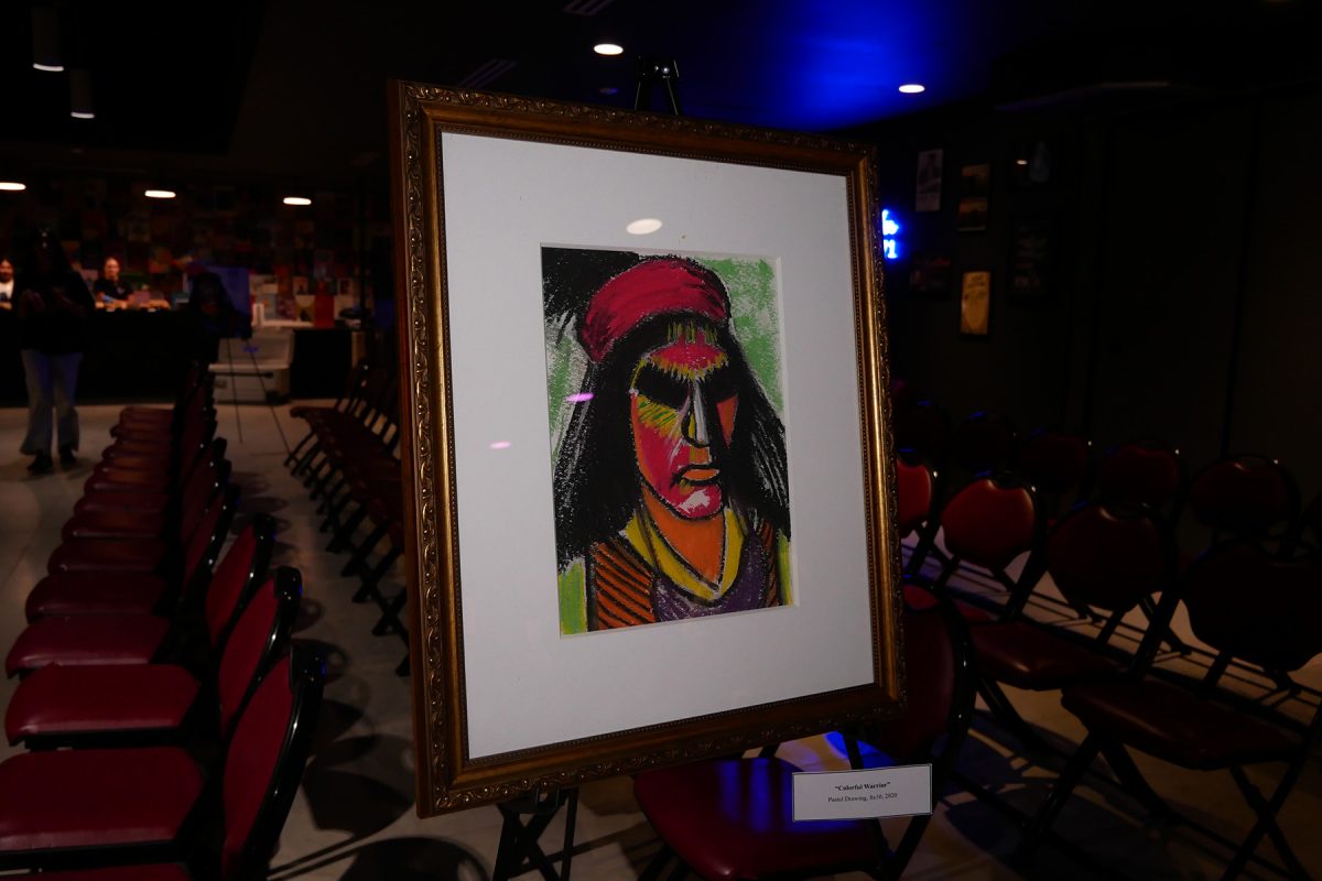 Elgin Jumper displayed his oil painting'Colorful Warrior' during a showcase Oct. 22, 2024, at Florida State University’s Club Downunder. (Club Downunder)