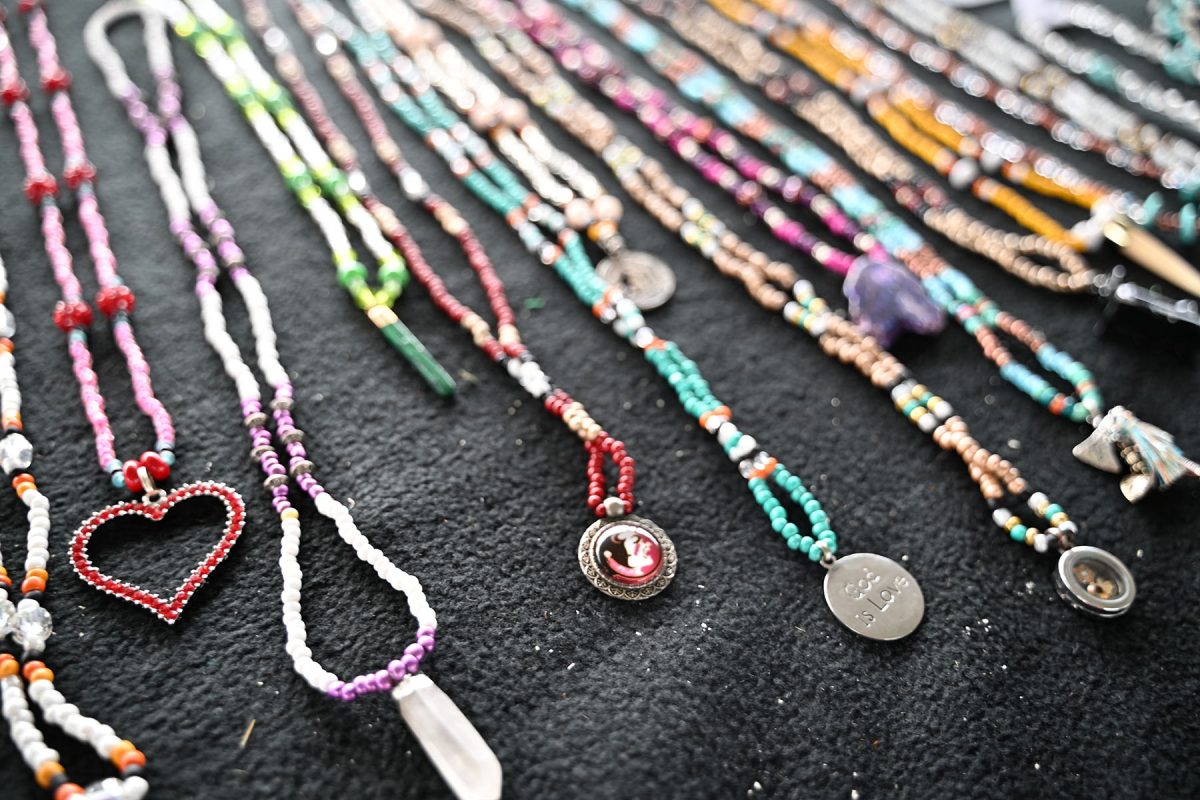 An Indigenous artist's handmade jewelry for sale during the Seminole Tribe of Florida's annual American Indigenous Arts Celebration in early November 2024. (Aiden Briesacher)