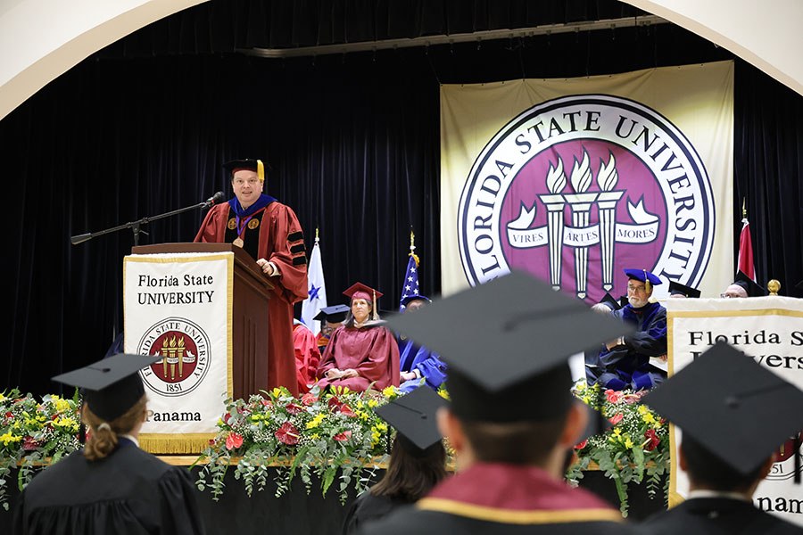 Damon Andrew, dean of the Anne Spencer Daves College of Education, Health, and Human Sciences, delivered the keynote speech during FSU Panama’s 2024 commencement ceremony Dec. 4. (Mia Serrudo/FSU Panama)