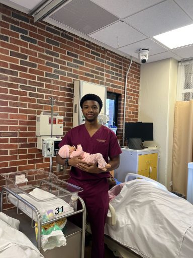 Roodens Benjamin is graduating from Florida State University's College of Nursing with a Bachelor of Science in Nursing.