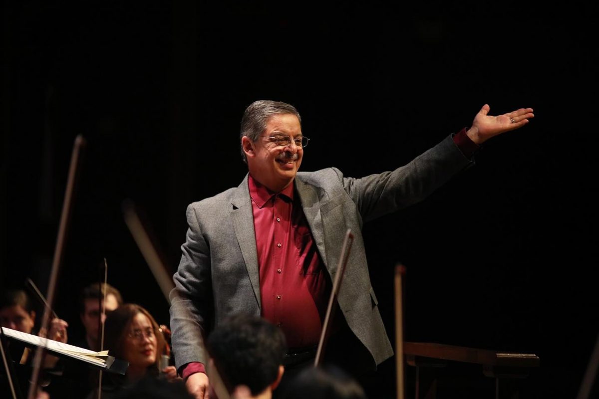 Professor of Conducting, Director of Orchestral Activities and String Area Coordinator Alexander Jiménez conducting during one of the musical numbers at the Ruby Diamond Concert Hall Feb. 1, 2025. (Josie Liederman)