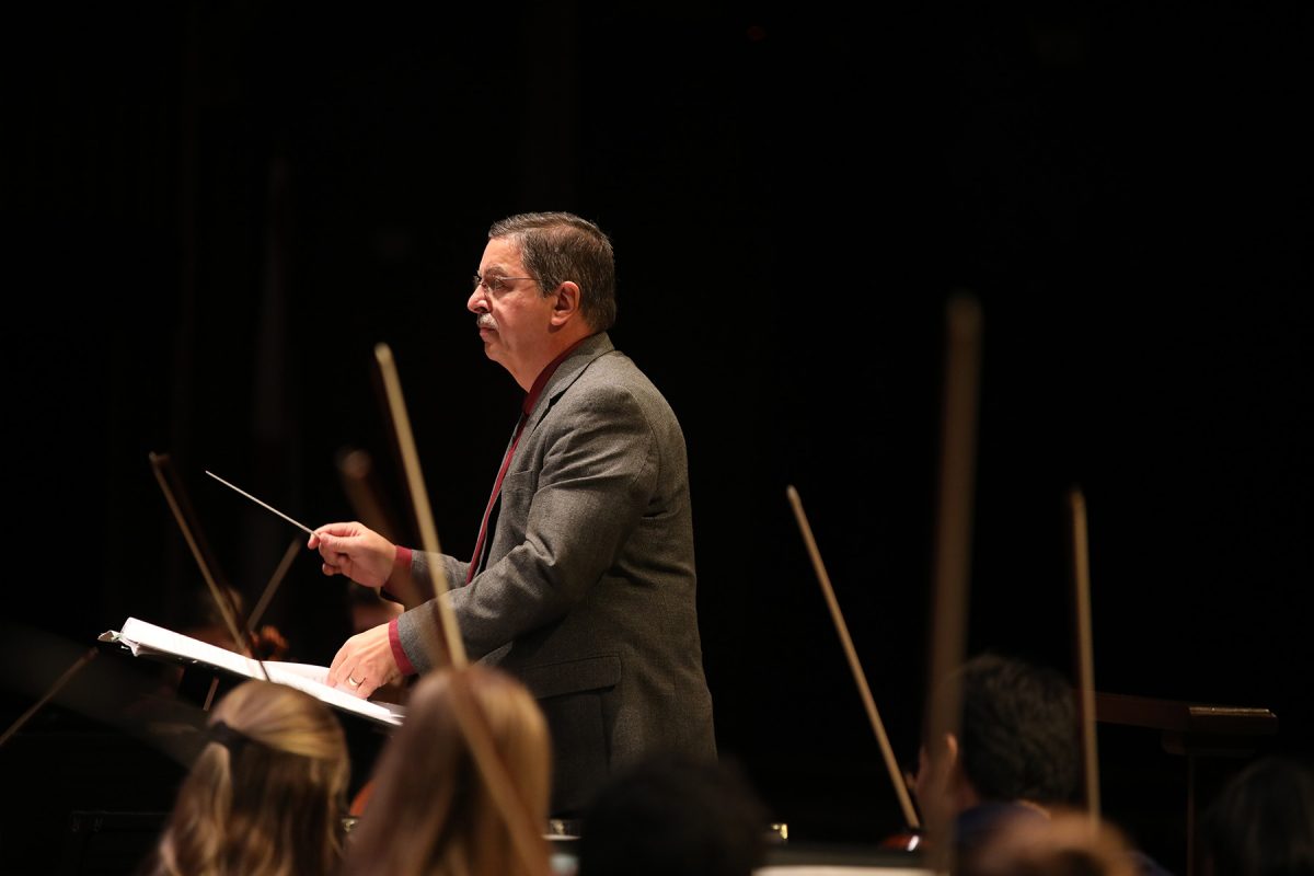 Professor of Conducting, Director of Orchestral Activities, and String Area Coordinator Alexander Jiménez conducting during one of the musical numbers at the Ruby Diamond Concert Hall Feb. 1, 2025. (Josie Liederman)