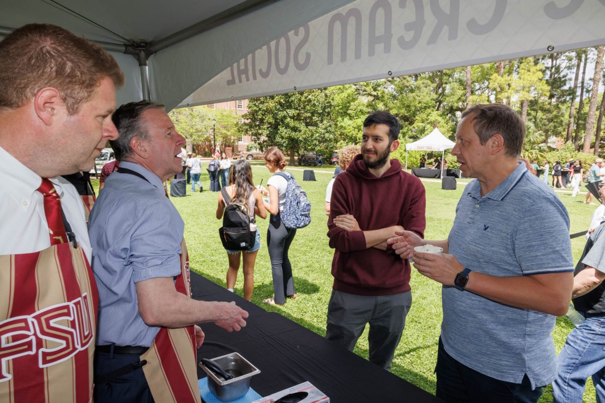 FSU President Richard McCullough speaks with students at the 2025 President's Ice Cream Social Thursday, April 3. (Florida State University)