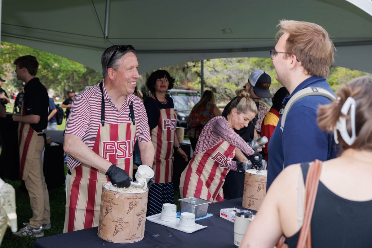 Students, faculty and staff gathered to enjoy delicious ice cream treats, handed out by President McCullough, First Lady Vartikar and other university administrators. (Florida State University)