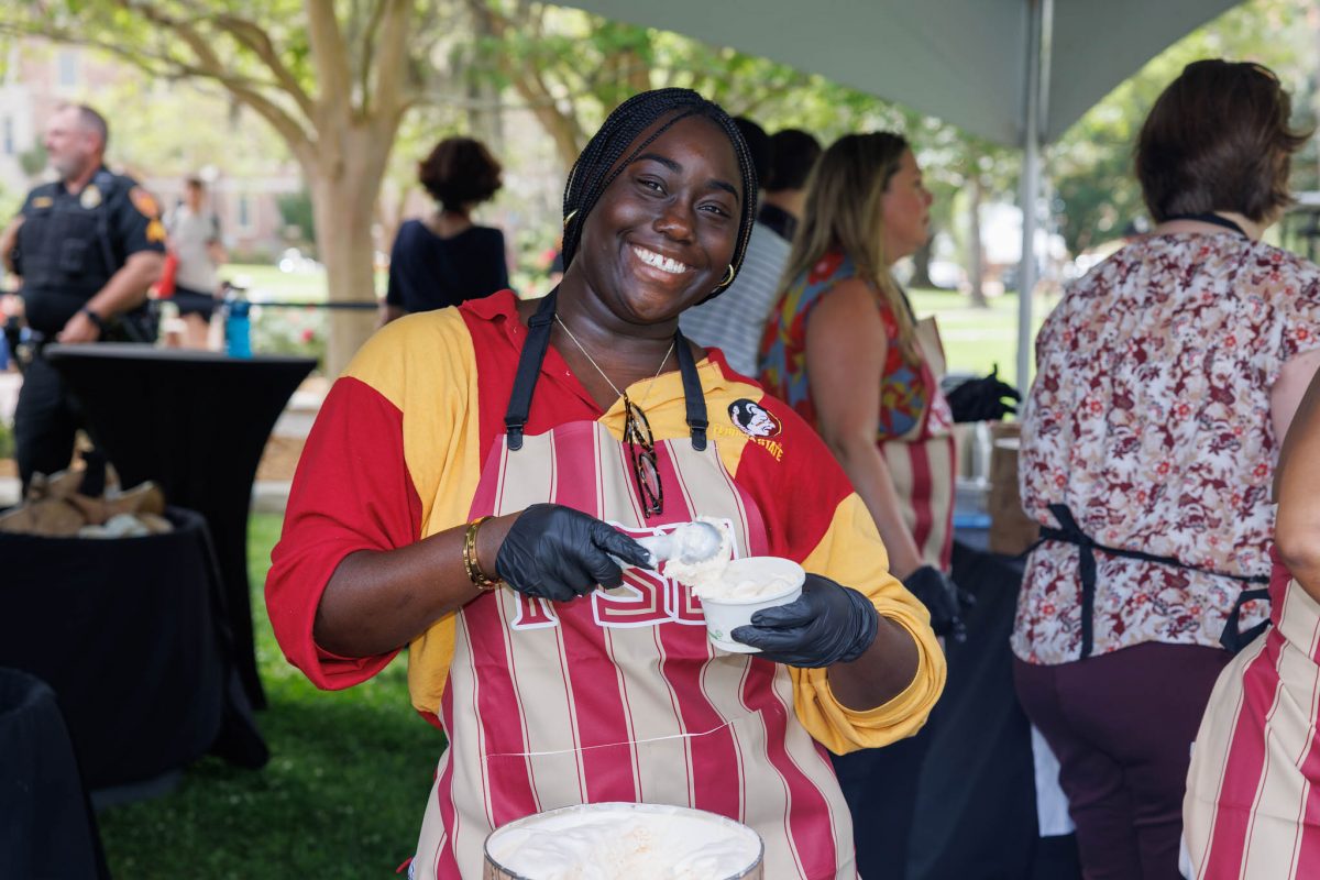 Students, faculty and staff gathered to enjoy delicious ice cream treats, handed out by President McCullough, First Lady Vartikar and other university administrators. (Florida State University)