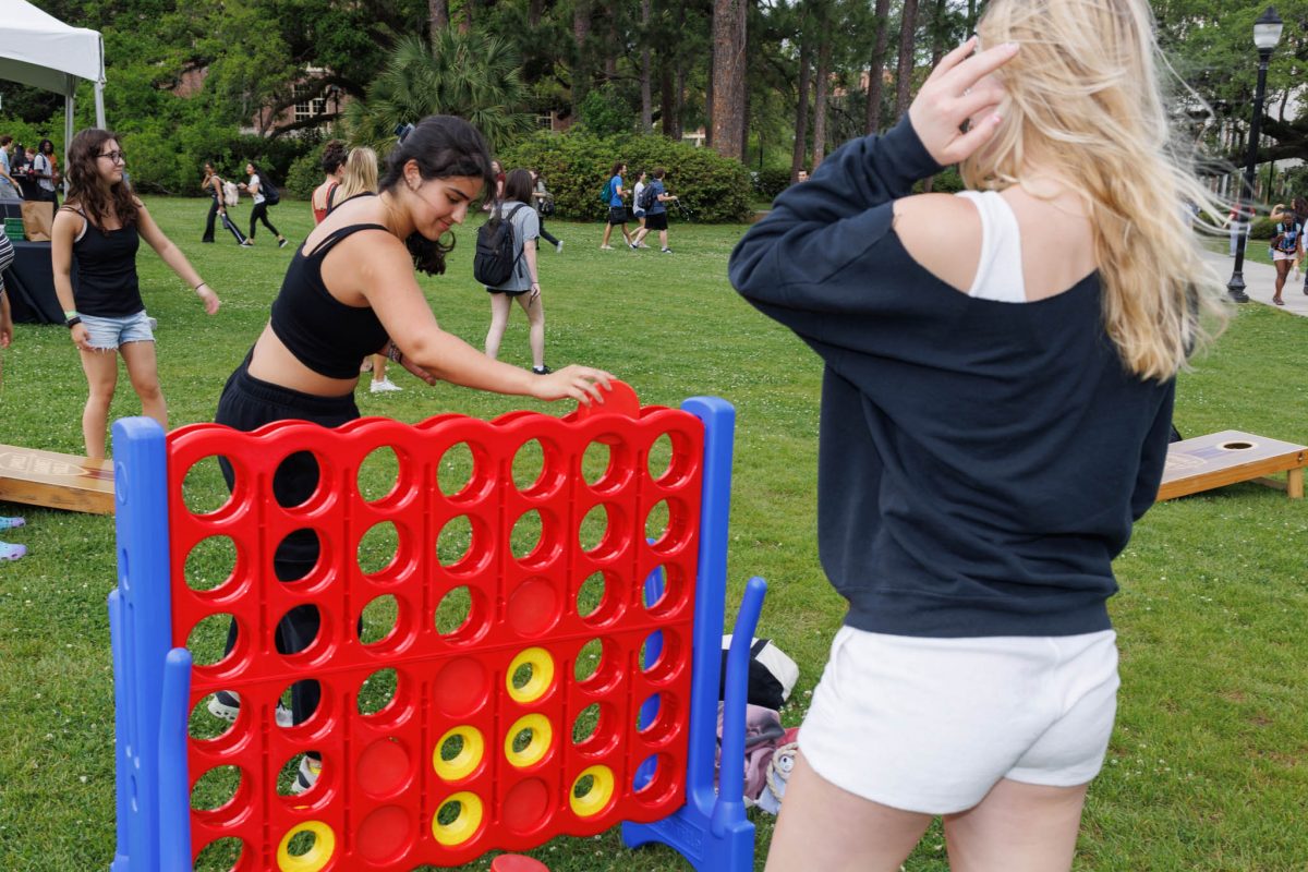 Students enjoy the 2025 President’s Ice Cream Social on Landis Green Thursday, April 3. The event was filled with outdoor entertainment and games, creating a festive atmosphere that brought smiles to everyone’s faces. (Florida State University)