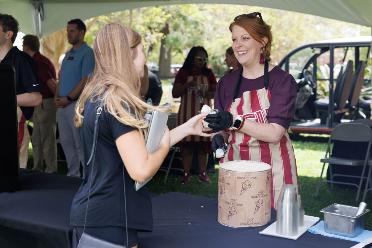 Students, faculty and staff gathered to enjoy delicious ice cream treats, handed out by President McCullough, First Lady Vartikar and other university administrators. (Florida State University)