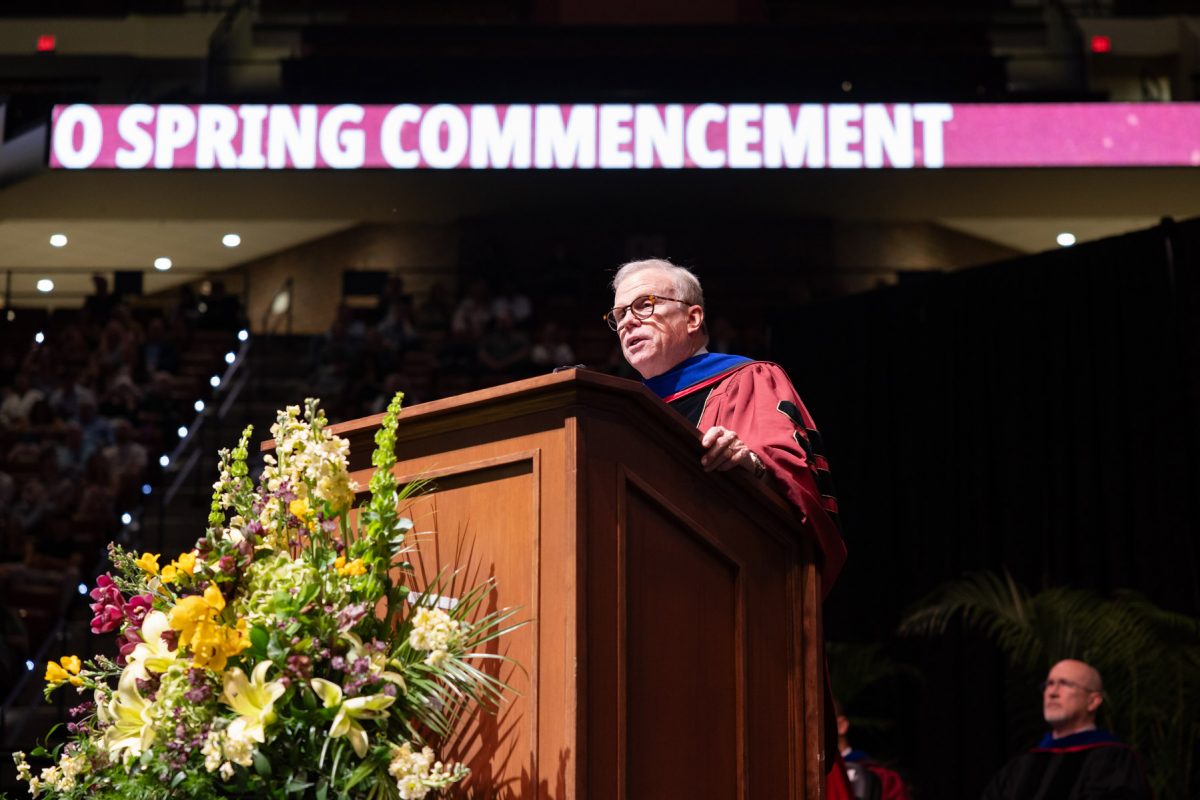 Ash Williams, vice chair for J.P. Morgan Asset Management and FSU alumnus, spoke to graduates from the College of Business during Florida State University's commecement ceremony at 2 p.m., Friday, May 2, 2025, at the Donald L. Tucker Civic Center. (FSU Photography)