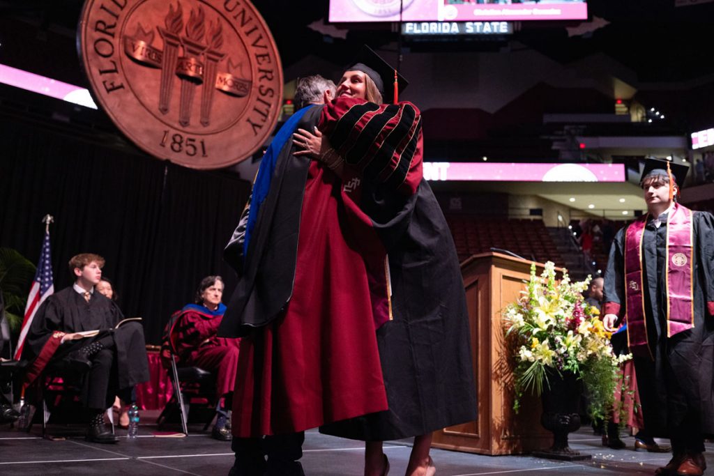 Florida State University President Richard McCullough congratulates a graduate at one of the university’s spring ceremonies Saturday, May 3, 2025, at the Donald L. Tucker Civic Center. (FSU Photography)