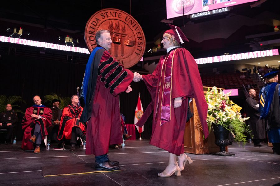 Florida State University President Richard McCullough congratulates a graduate during one of the spring commencement ceremonies Saturday, May 3, 2025, at the Donald L. Tucker Civic Center. (FSU Photography Services)