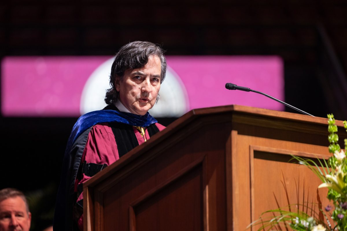 Florida State University Provost Jim Clark speaks to graduates and their guests at the university’s spring doctoral hooding ceremony Friday, May 2, 2025, at the Donald L. Tucker Civic Center. (FSU Photography)