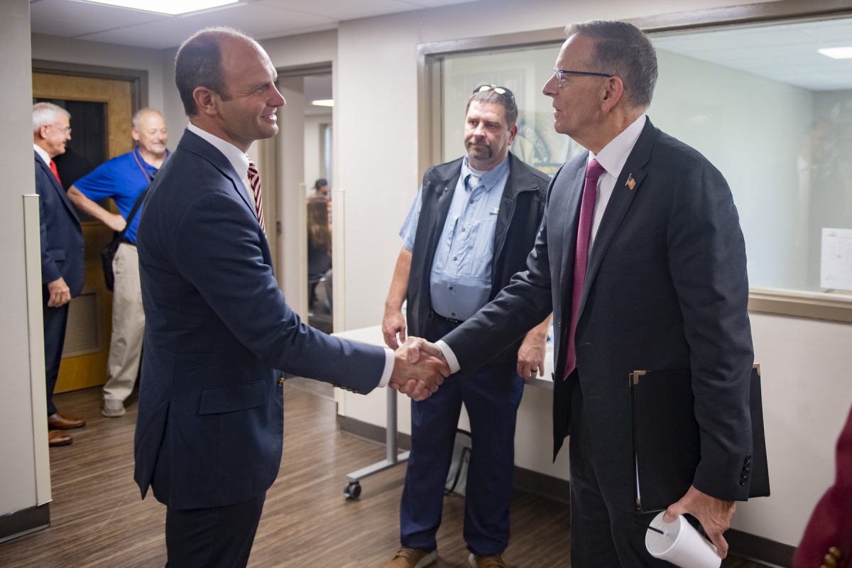 Florida State University Associate Provost and Dean of Undergraduate Studies Joe O’Shea (left) shakes hands with the Deputy Secretary of the U.S. Department of Veterans Affairs Paul R. Lawrence (right) before a roundtable discussion with student veterans on June 24, 2025. (Matthew McConnell/Florida State University)