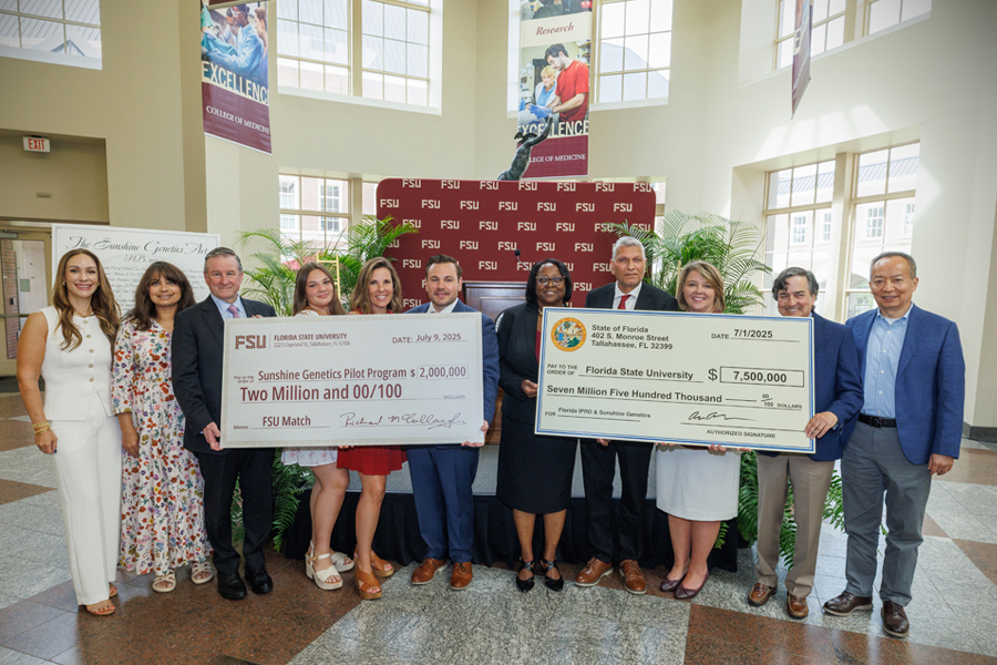 A ceremony at the FSU College of Medicine celebrating the signing of HB 907, the Sunshine Genetics Act. Rep. Anderson presented a check for $7.5 million from the State of Florida to support the Sunshine Genetics Pilot Program and the Florida Institute for Pediatric Rare Diseases at Florida State University. (Bill Lax/FSU Marketing)