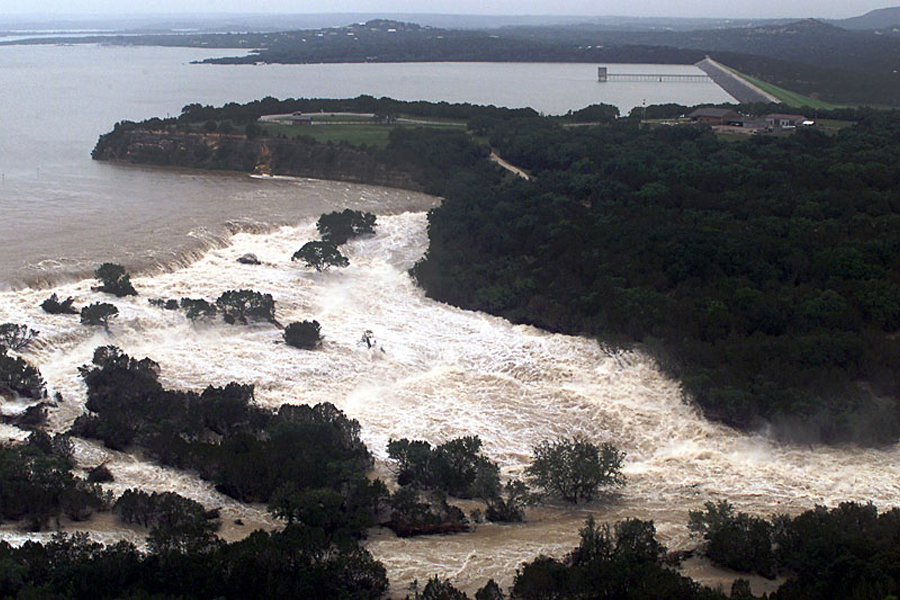 Water overflowing the spillway at Canyon Dam in Texas in 2002. (Courtesy of US Army Corps of Engineers)
