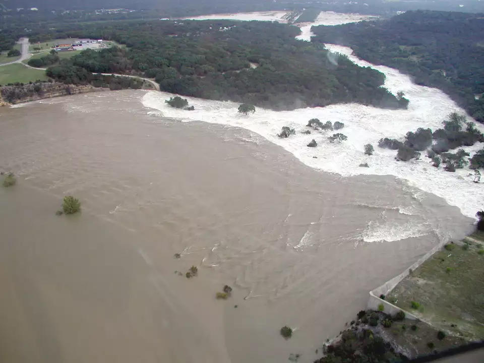 Water overflowing the spillway at Canyon Dam in Texas in 2002. (US Army Corps of Engineers)