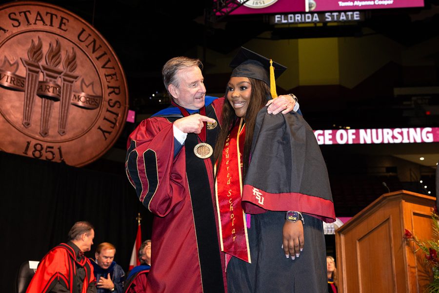 Florida State University President Richard McCullough congratulates a graduate during one of the summer commencement ceremonies, Friday, Aug. 1, 2025, at the Donald L. Tucker Civic Center. (FSU Photography Services)