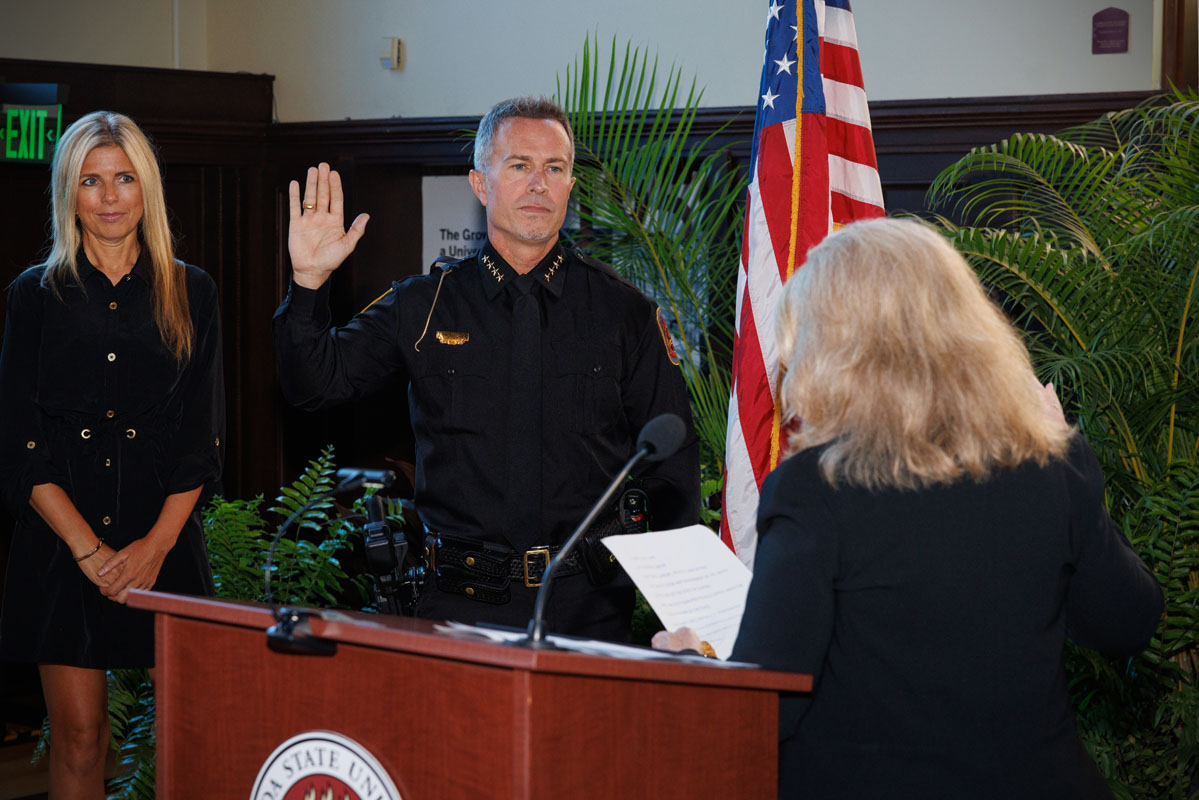 Assistant Vice President for Public Safety Barbara O'Connor swears in Jason Trumbower as FSU Chief of Police Tuesday, Aug. 12, 2025, during a ceremony at Dodd Hall. (Bill Lax/FSU Photography)