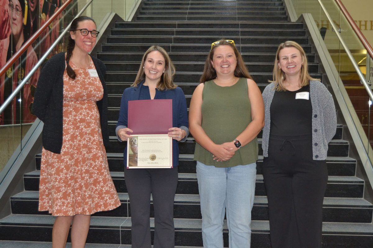 Ashley Allen Carr, from the Department of Chemical and Biomedical Engineering, won first place in the 5MR competition for her presentation “Living Glass in Space.” (Debra Fadool)