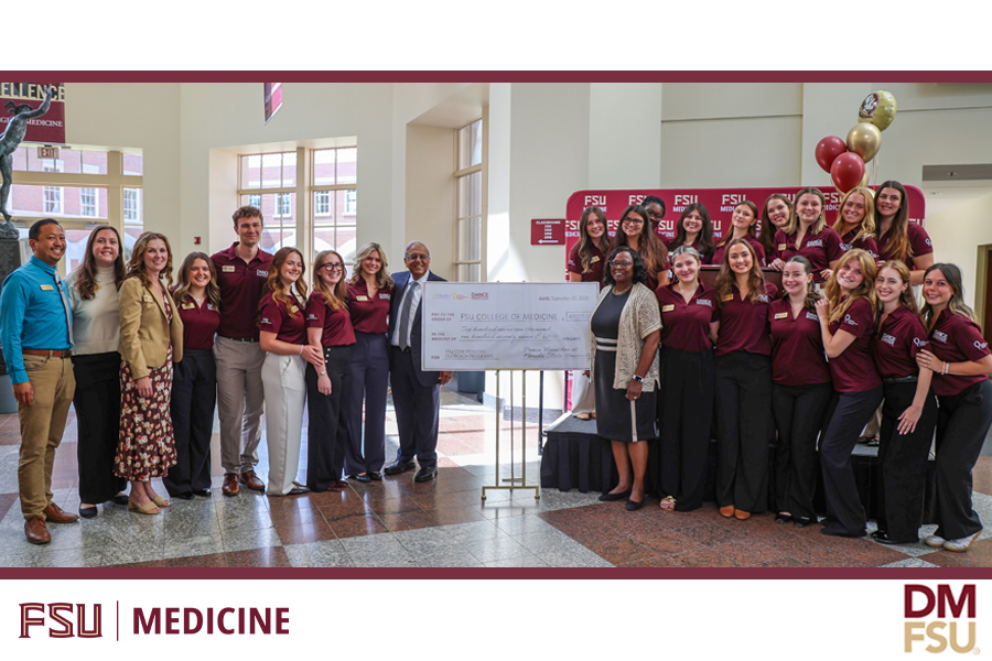 Dance Marathon at Florida State University (DM at FSU) student organizers present a check for $616,177.06 to the FSU College of Medicine for pediatric outreach programs. Since the FSU College of Medicine was added as a recipient of DM at FSU fundraising in 2003, the organization has contributed more than $10 million to the college.