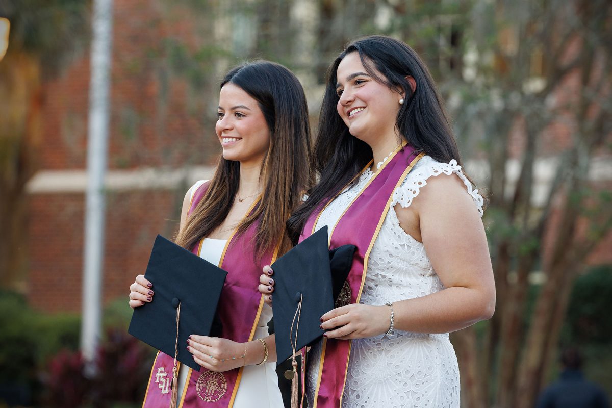 Graduates gather for photos at FSU’s historic Westcott Building. (Bill Lax/Florida State University)