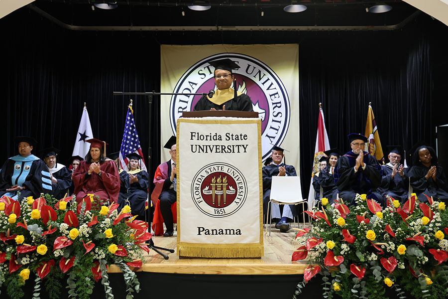 Suvranu De, dean of the FAMU-FSU College of Engineering, delivers the keynote speech during FSU Panama's 2025 commencement ceremony Dec. 3 at the City of Knowledge Convention Center in Panama City, Republic of Panama. (Valeria Tovar/FSU Panama)