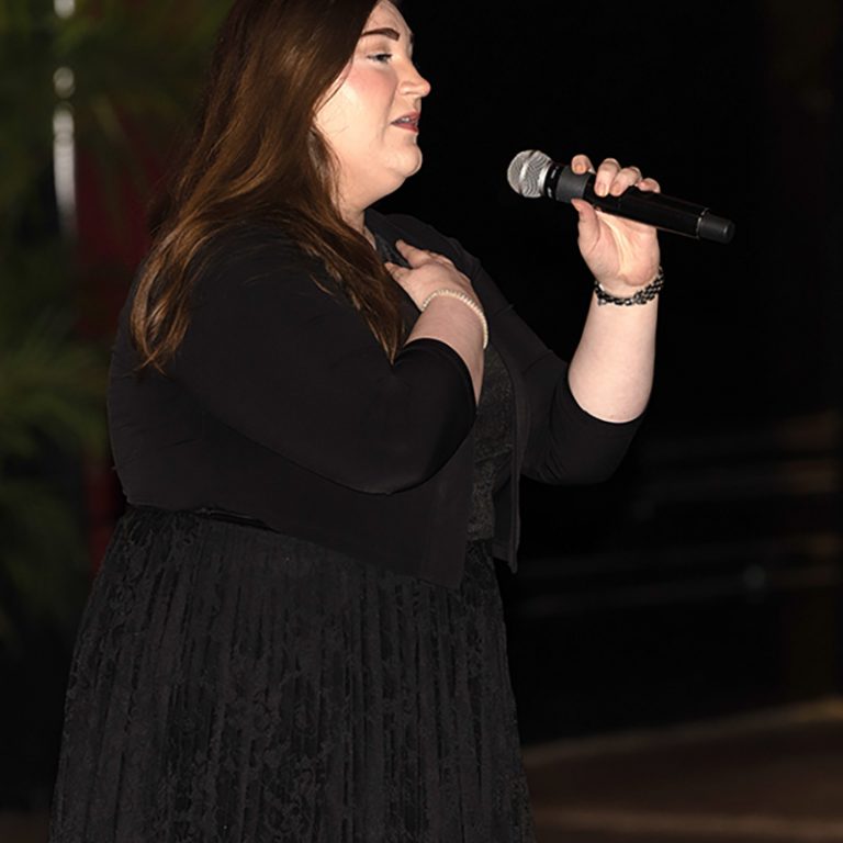 Caitlin Ecuye is pursing her doctorate in Vocal Performance and performed the National Anthem. (Bill Lax/ Florida State University)
