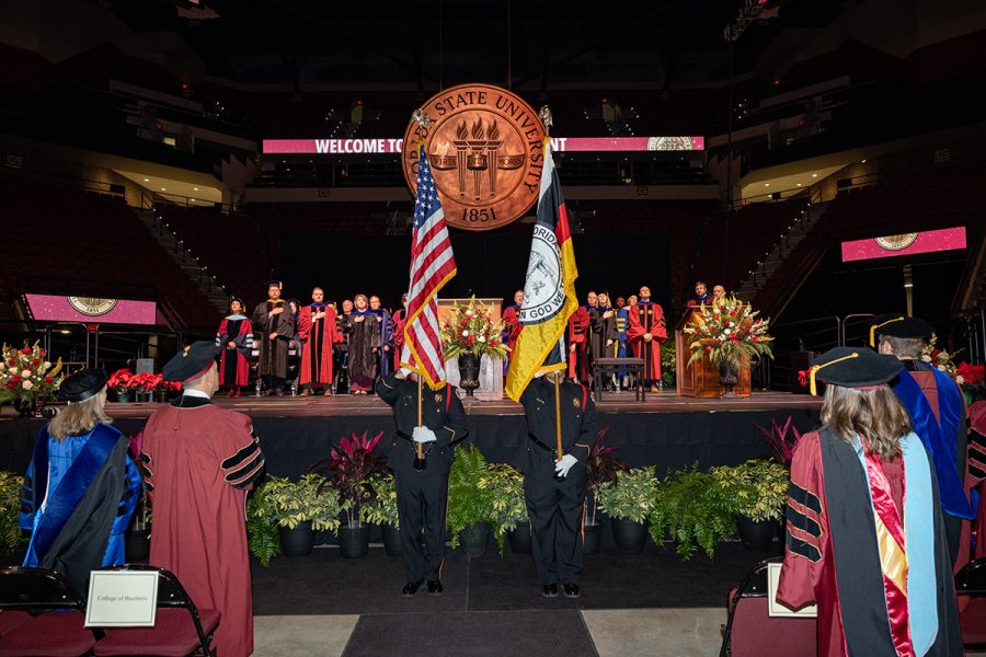 Lieutenants Nick Garcia and Michael Dolnick, part of The Seminole Tribe of Florida’s Fire Rescue Color Guard, during one of FSU's summer commencement ceremonies Friday, Dec. 12, 2025, at the Donald L. Tucker Civic Center. (Bill Lax/ Florida State University)