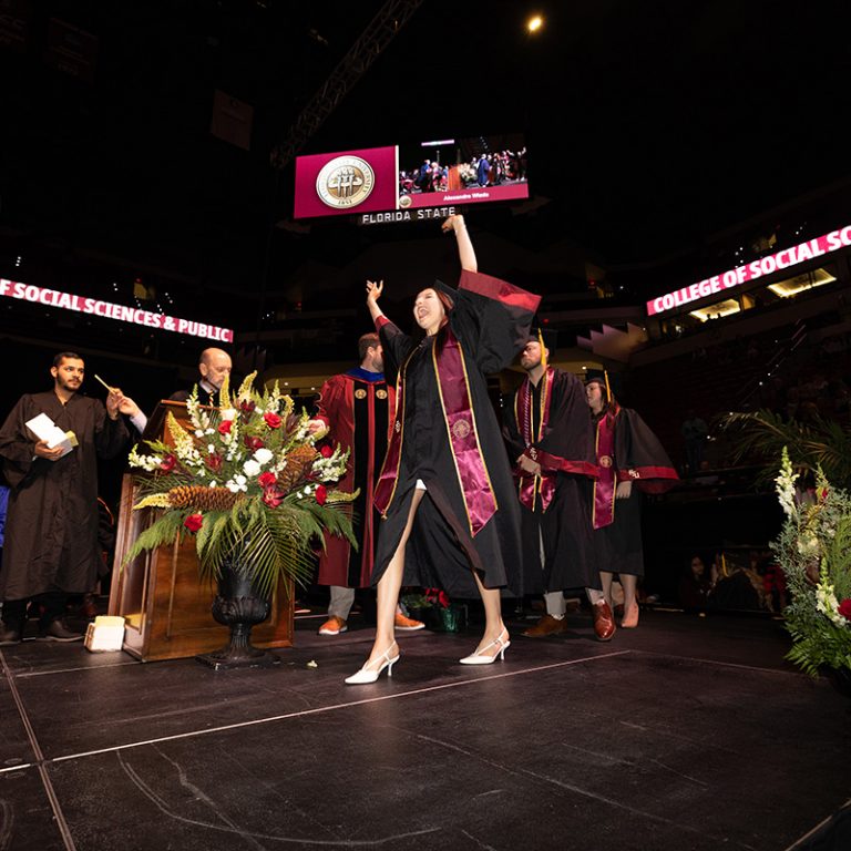 Graduates cross the stage to receive their diplomas during Florida State University’s fall 2025 commencement Friday, Dec. 12, 2025, at the Donald L. Tucker Civic Center. (Bill Lax/ Florida State University)
