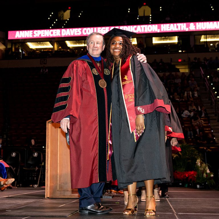 Florida State University President Richard McCullough congratulates a graduate during fall commencement on Friday, Dec. 12, 2025, at the Donald L. Tucker Civic Center. (Bill Lax/ Florida State University)