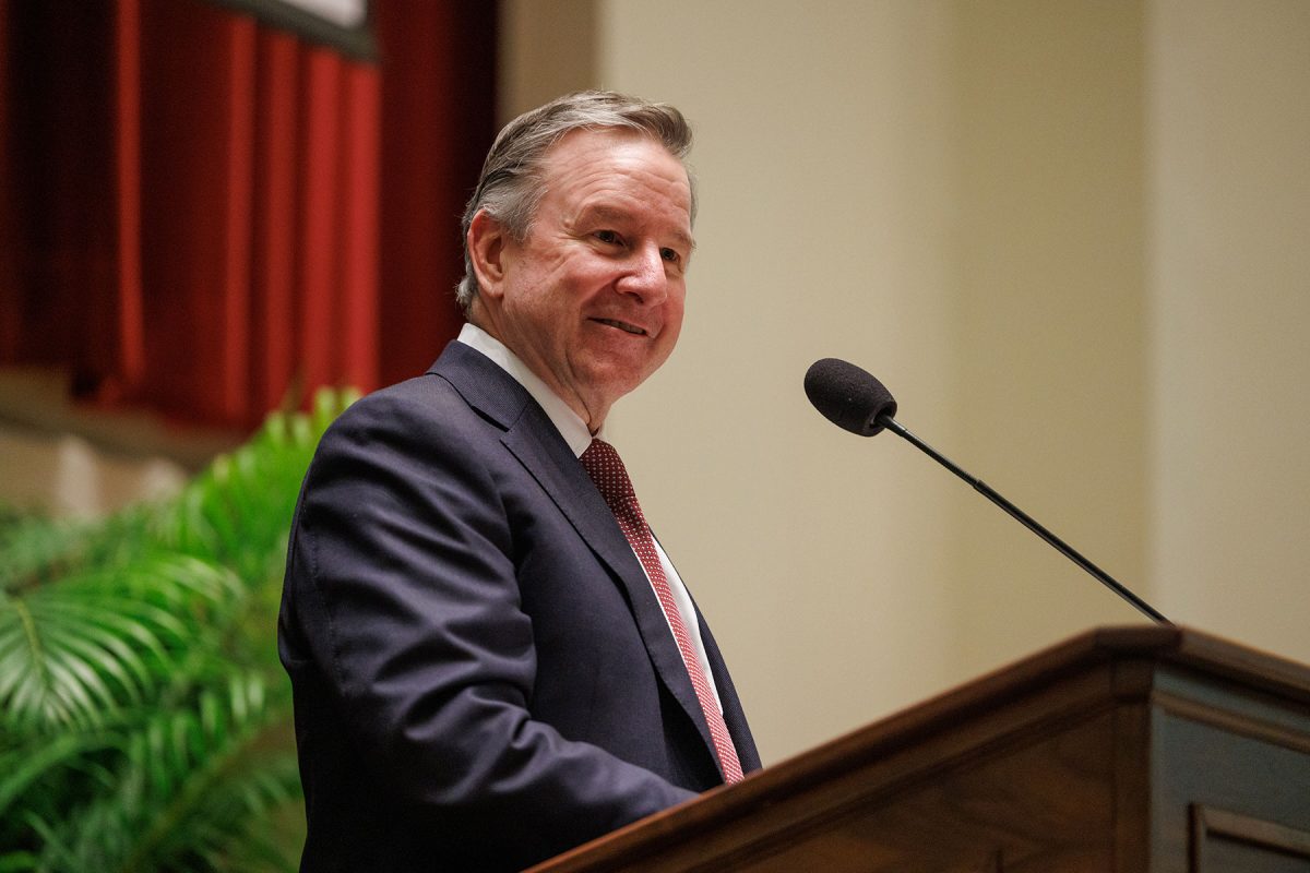 FSU President Richard McCullough smiles at the podium at the College of Medicine auditorium.