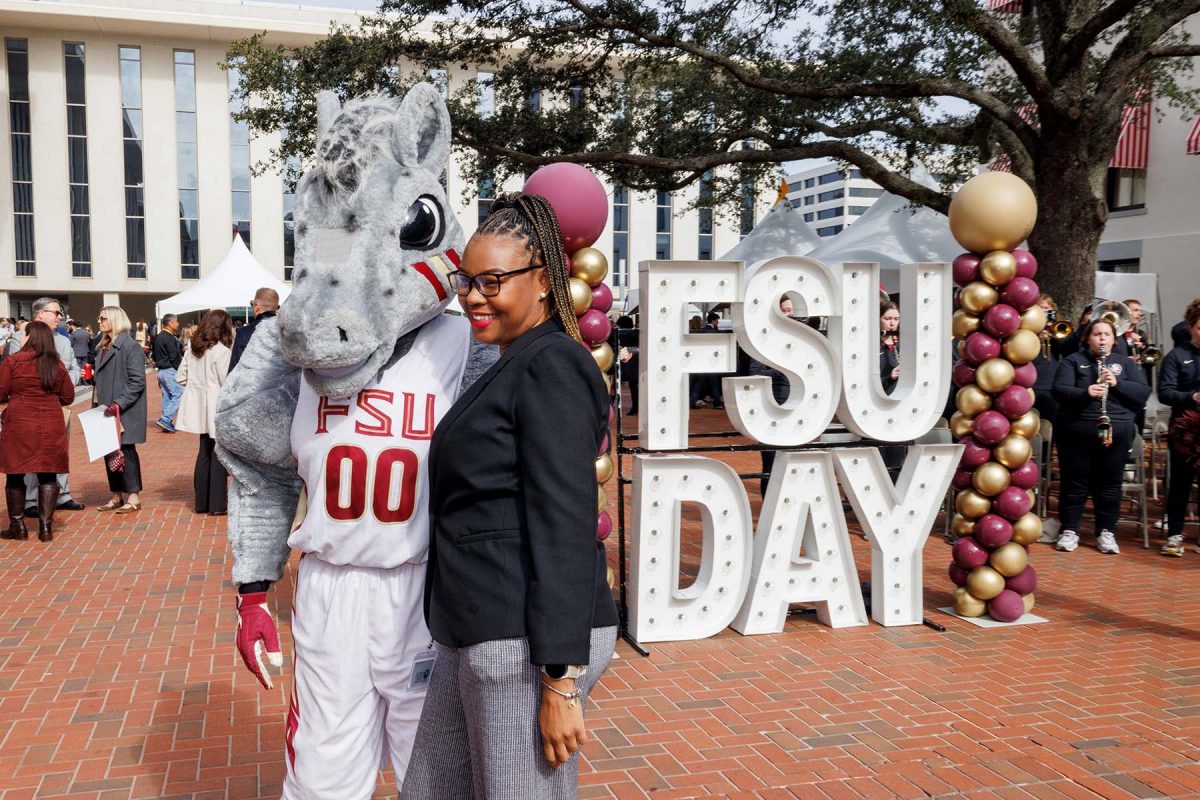 An attendee poses with FSU’s Cimarron during the FSU Day at the Capitol festivities Jan. 21, 2026. (Bill Lax/FSU Photography)