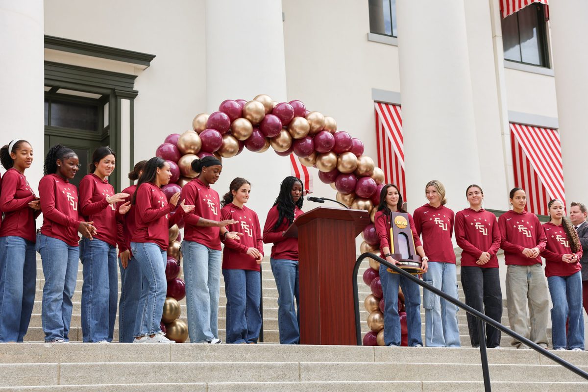 FSU Women’s Soccer players pose with the 2025 National Championship trophy at the FSU Day at the Capitol pep rally Jan. 21, 2026. (Casey McCarthy/FSU Photography)