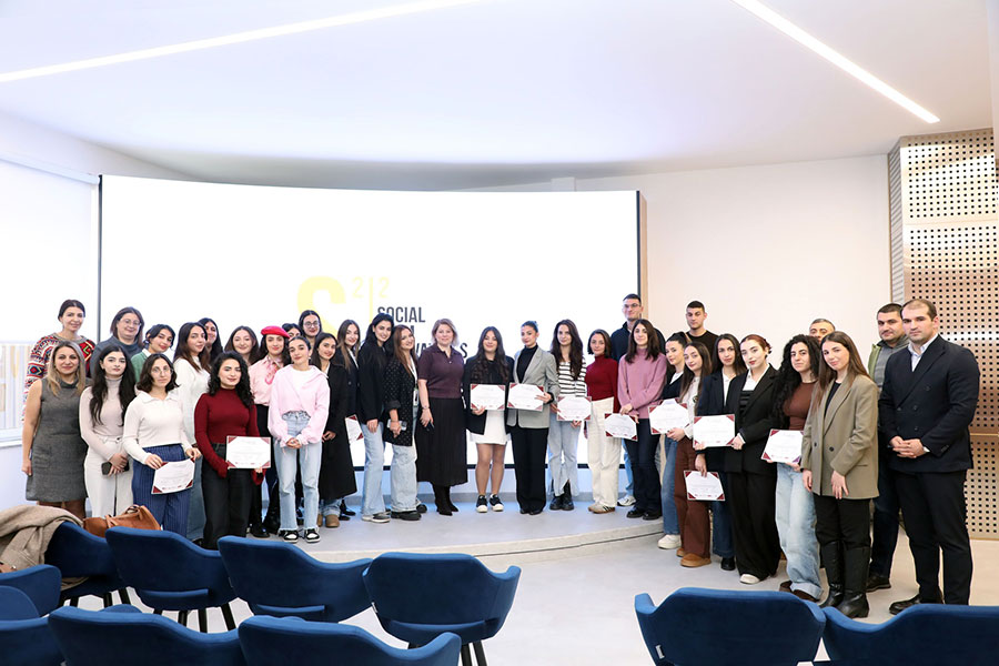 ASUE students holding the certificates they earned for completing a COIL project with FSU students. (Grisha Amirkhanayn/ASUE)