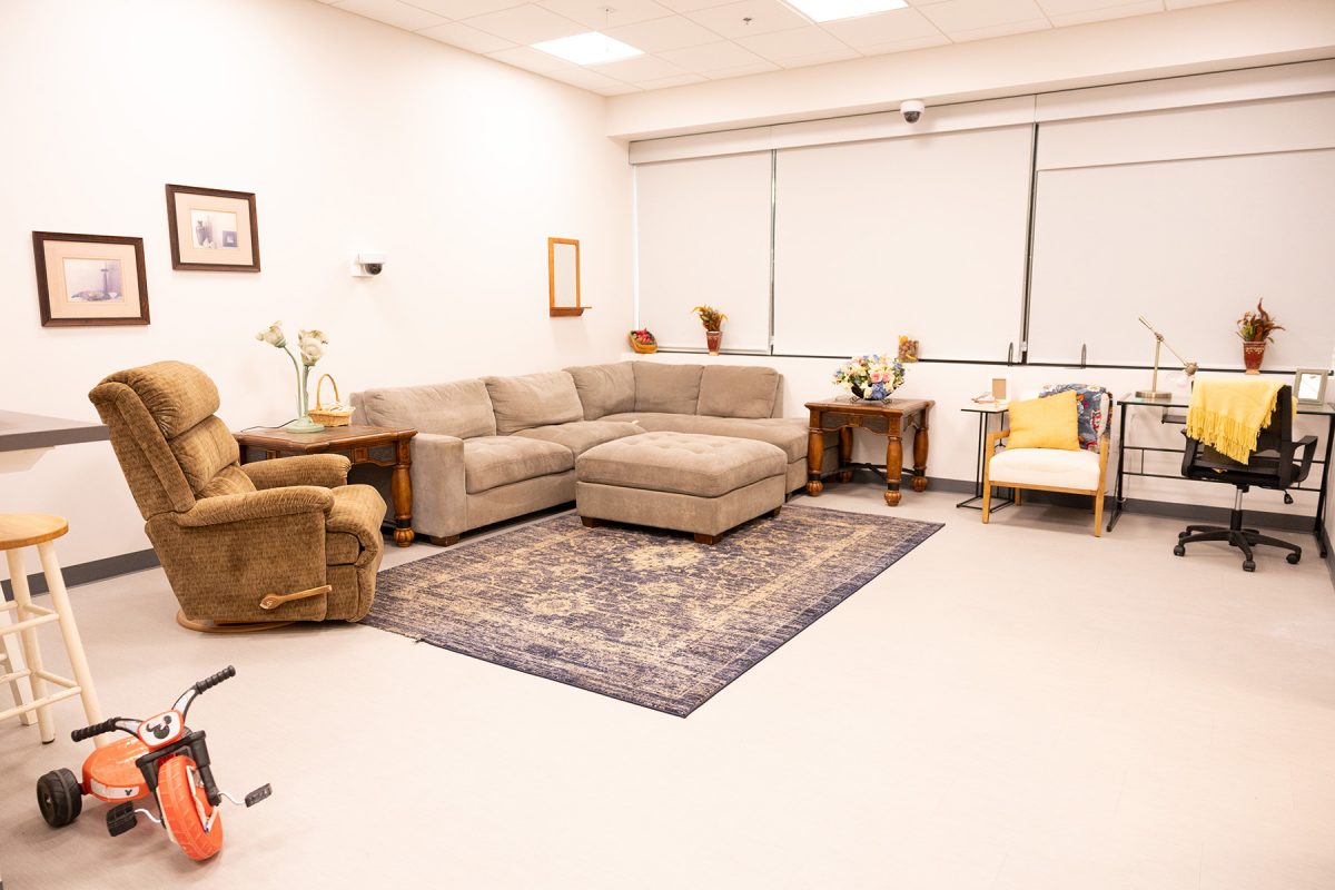 This fully immersive lab allows students to rehearse professional skills in a simulated home while peers and facilitators provide real-time feedback from a nearby debriefing room. (Logan Lowery/Florida State University)
