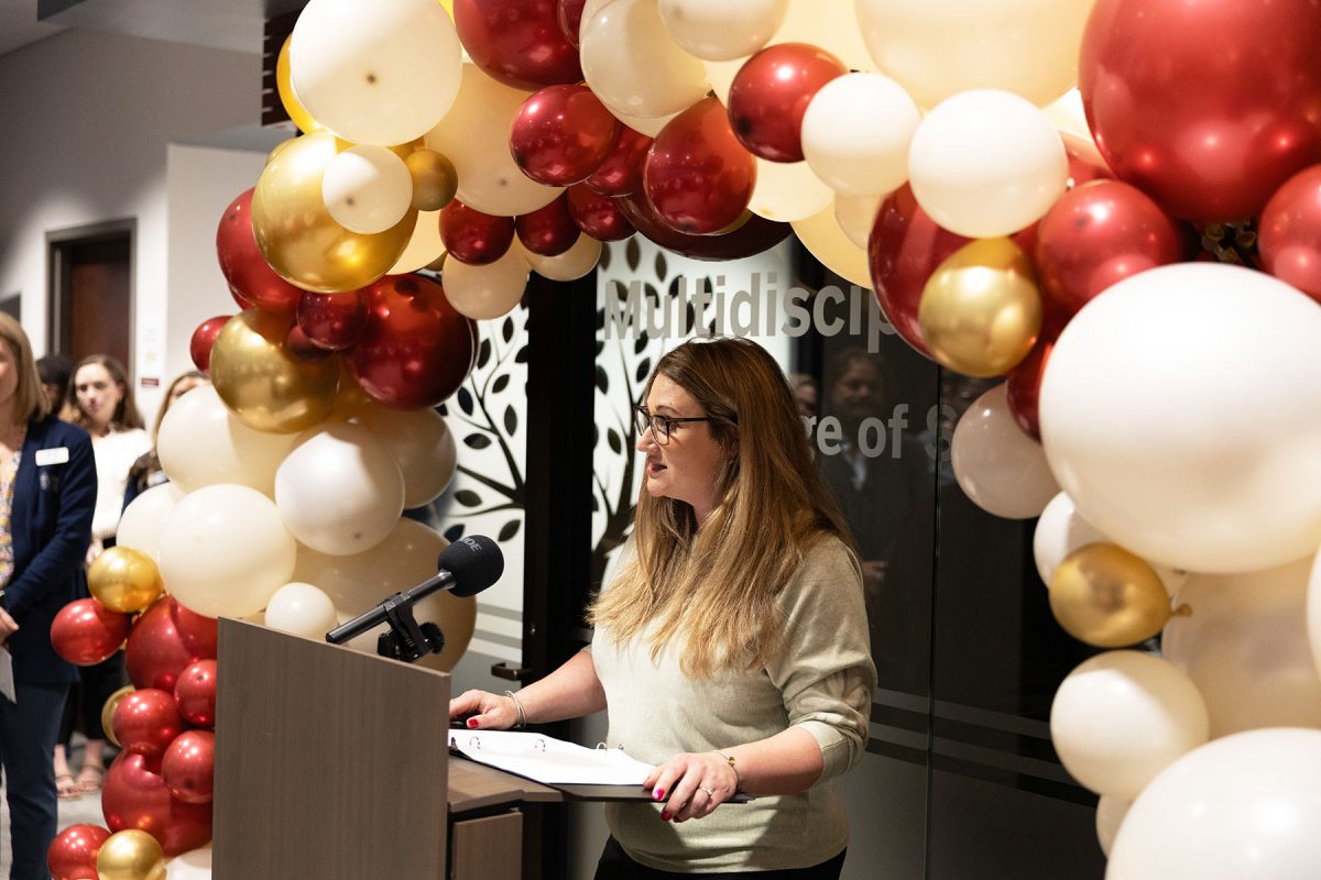 Lisa Magruder, director of FICW, discusses the impact of the new Maryland Building during the grand opening celebration. (Logan Lowery/Florida State University)