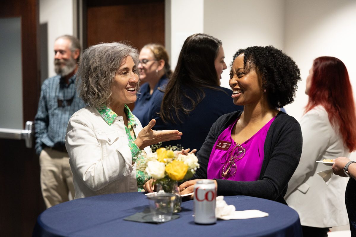 MDC Director Shannon Bennett connects with visitors during the grand opening reception. (Logan Lowery/Florida State University)