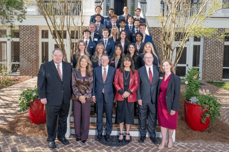 Joining the seventh cohort of the James M. Seneff Honors Program on the back stairs of the FSU President's House are James and Martha Seneff; President Richard McCullough and First Lady Jai Vartikar; and Dean Michael Hartline and Marsha Hartline. (Photo provided by Kallen Lunt)