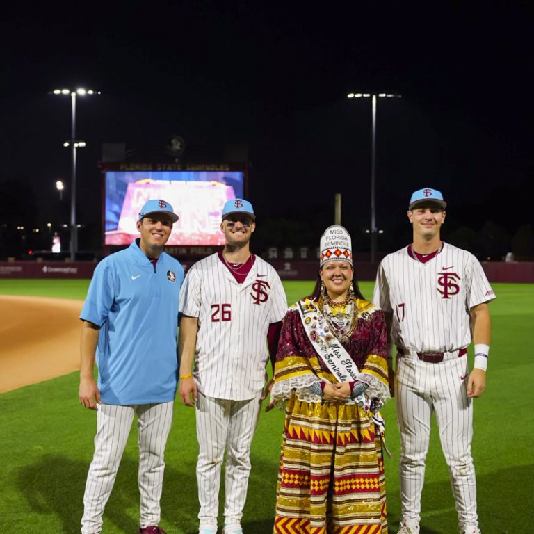 Group photo of four people
