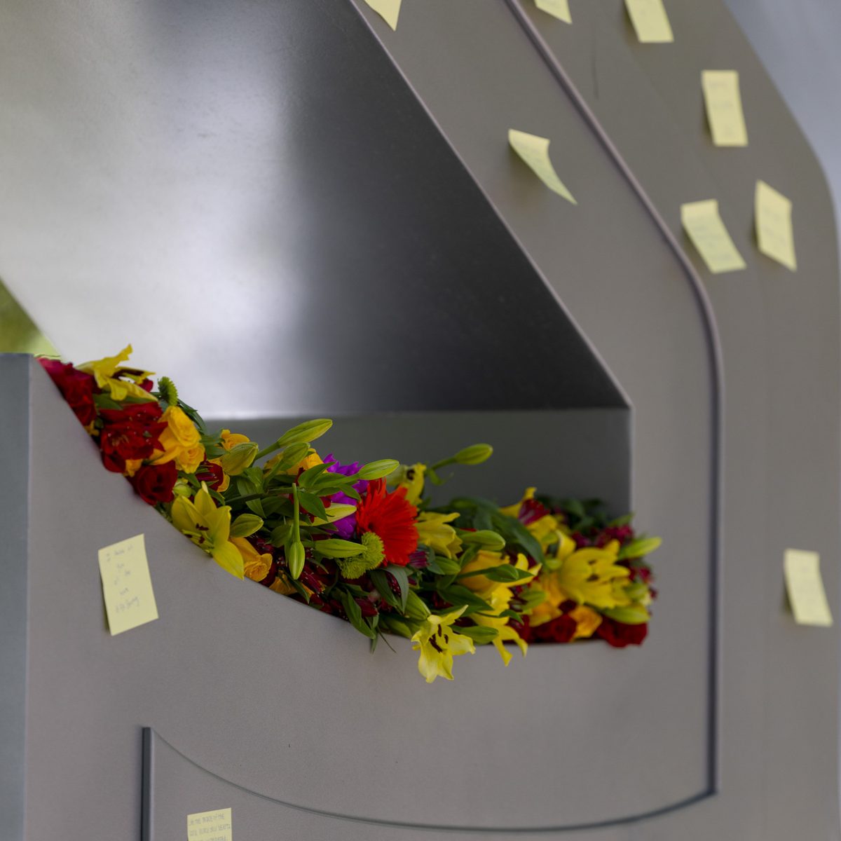 Flowers laid on top of the FSU letters outside the student union