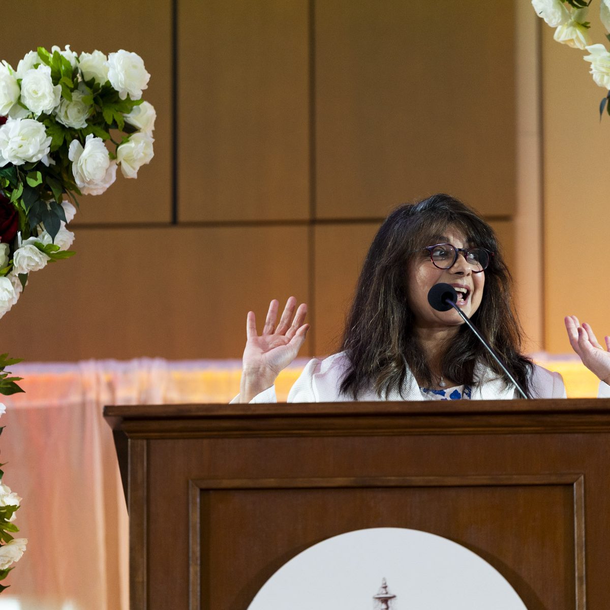 person speaking at the podium