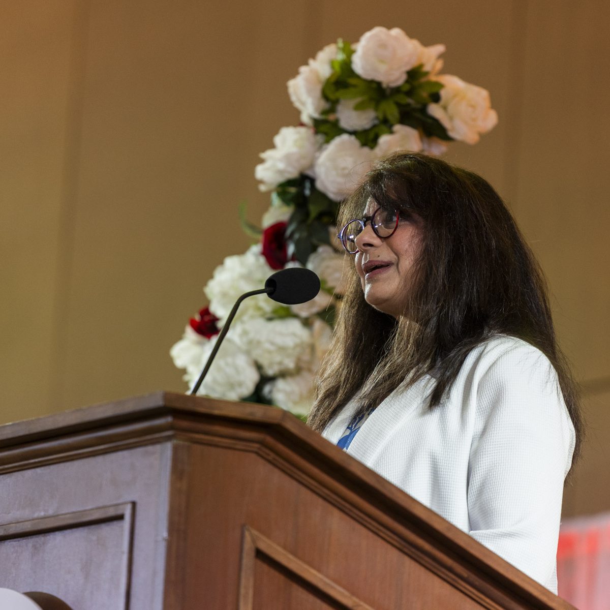 person speaking at the podium